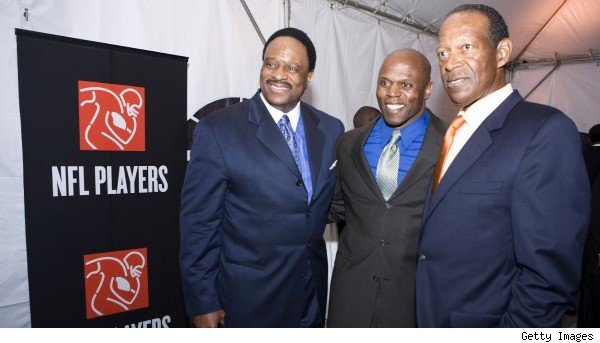 Ken Harvey (center) with James Brown (left) and the late Gene Upshaw (right) Getty Images